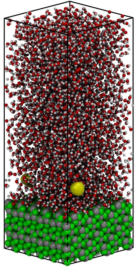 Fig. 1 Representation of the initial stage of heterogeneous water nucleate boiling in contact with the hydrophilic (-111) interface of mZrO2. An initial void at distance ~7Å from the solid interface nucleates © PSI