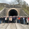 Participants of the ANCHORS Annual Meeting in front of a tunnel entrance.